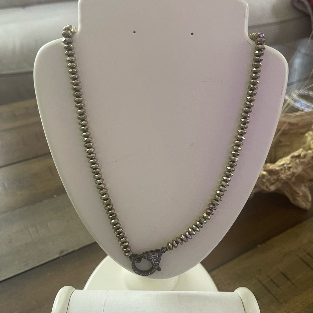 Refurbished LV earrings and necklace set.